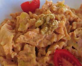 ricetta: Farfalle in salsa di noci e pomodori